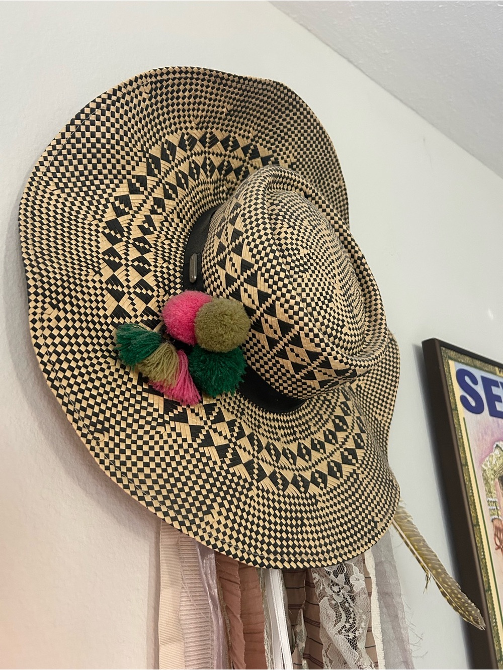 Handwoven Black & Natural Wide-Brim Hat with Colorful Pom Tassels